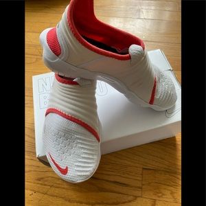 NIKE FREE RUN! Size 6! White/red or orangish detail…. Like new worn twice!!